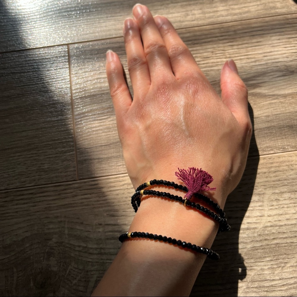 Stretchy Dark Blue/Black Beaded Layering Bracelet with Purple Tassels